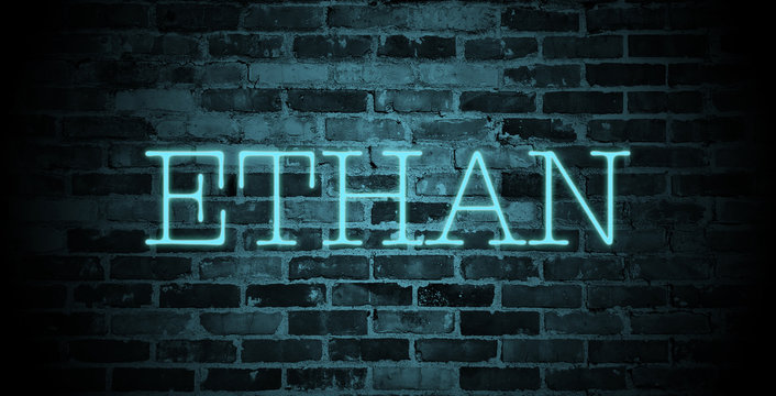 first name Ethan in blue neon on brick wall