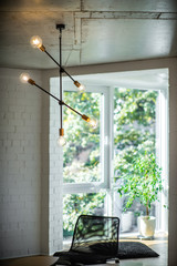 Chandelier and lighting in a modern apartment. Decoration of the apartments. © Aleks Kend