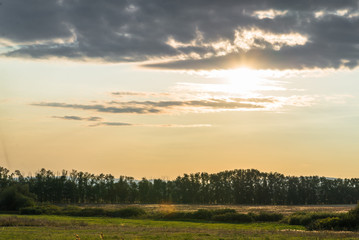 Landscape of the sunset over the mountain and trees