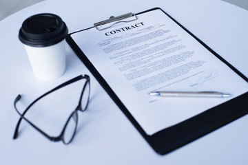 Business contract on table