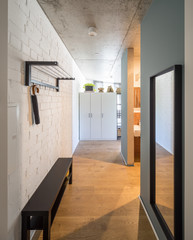 Entrance hall and corridor in a modern apartment. Entrance hall and entrance door to studio apartments.  © Aleks Kend