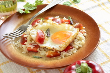 Rice with vegetables topped fried egg