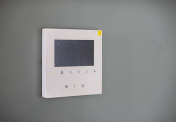 Smart home, remote control in the modern interior of the apartment. © Aleks Kend