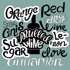 Mulled wine with bottle and ingredients.