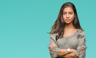 Young beautiful arab woman over isolated background skeptic and nervous, disapproving expression on...