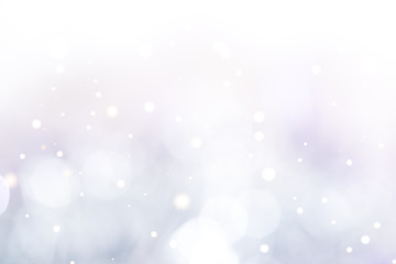 Light blue bokeh light. Abstract background. Half white and half colored.