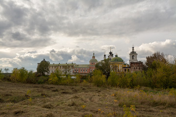 Naklejka na ściany i meble Holy Trinity Belopesotsky Convent in the cloudy autumn afternoon in a distance