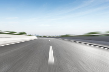 Naklejka premium blurred motion highway through country side