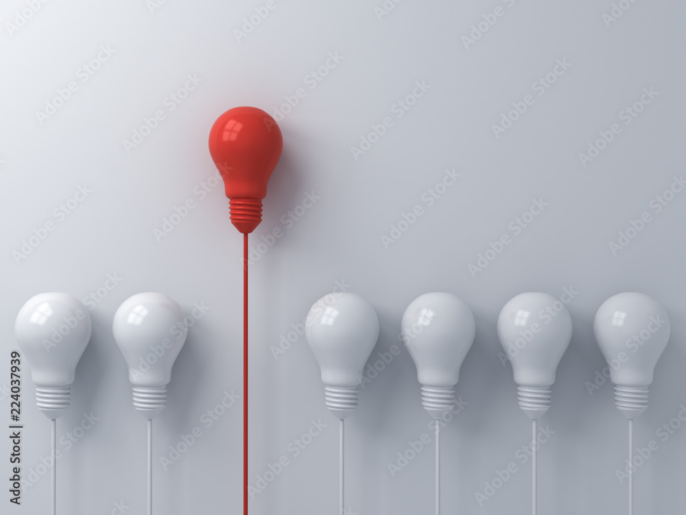 Leinwandbilder think different concept one red light bulb standing out from the dim white light bulbs on white wall
