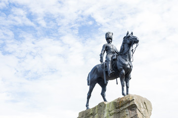 Fototapeta na wymiar The Royal Scots Greys Monument statue in Edinburgh, Scotland