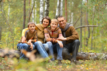 Fototapeta premium Portrait of family of four in park