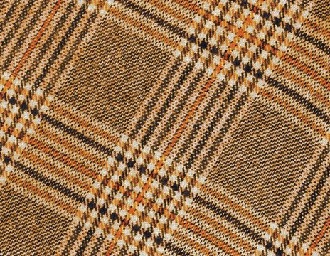 Tartan laineux orange et brun pour fond.