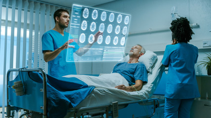 Futuristic Medical Ward with Sick Patient Lying in Bed. Doctor Using Augmented Reality Interface and Thinking about Brain Scans and Medical History of the Patient. Nurse Does Checkup.