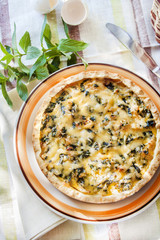 Cheese tart with cauliflower and mint