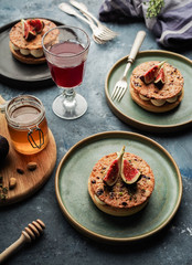 Tarte on sand base with fresh figs, almonds and crispy waffle with almonds and cocoa powder. Fresh Homemade Fruit Tart with berries