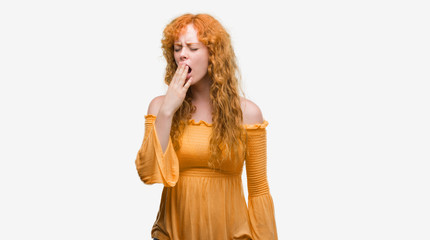 Young redhead woman bored yawning tired covering mouth with hand. Restless and sleepiness.