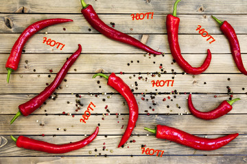Red chili pepper on wooden background Close up