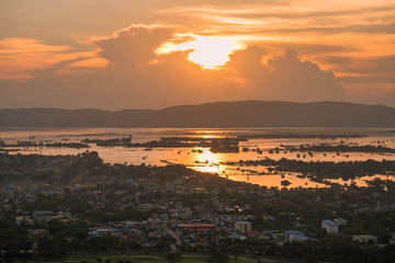 Mandalay city with Irrawaddy river and mountains background from top of Mandalay Hill at Sunset. landmark and popular for tourist attractions in Myanmar