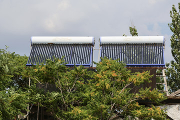 Vacuum solar cells for water heating system on the house roof