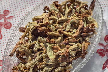 Clean cropped shoot of traditionally dried under sun string beans on transparent with table sheet