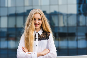 Positive girl in office look pose at downtown