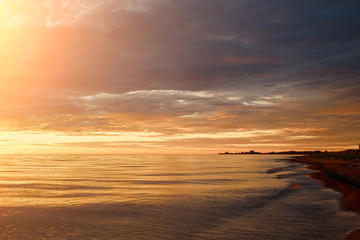 Majestic summer sunset over the Chudskoy lake