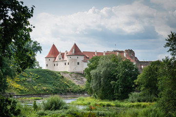 Naklejka na ściany i meble View to the Bauska Castle former residence of the Duke of Courland, seat of the Livonian order. Bauska, Latvia.