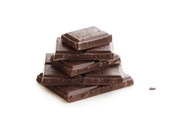Chocolate pieces isolated on white background