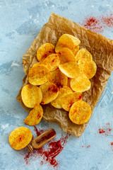 Spicy potato chips with paprika and salt.