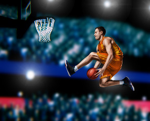 basketball player making slam dunk on basketball arena