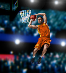 basketball player making slam dunk on basketball arena