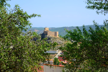 Fototapeta na wymiar Enguidanos, Spain - September 2, 2018: Population of Enguidanos and its castle.