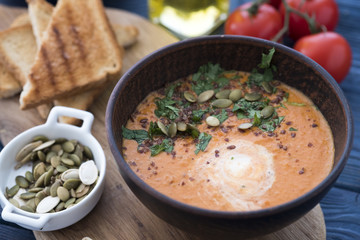 Bowl of pumpkin soup with bread. Tasty  pumpkin puree soup.