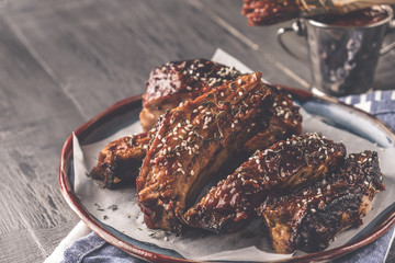 Tasty roasted sliced barbecue pork ribs.  Toned photo