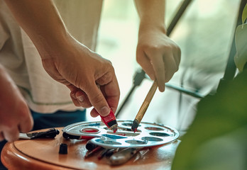 Painter draws a picture