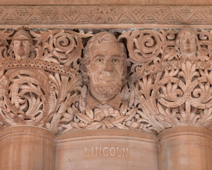 Abraham Lincoln stonework detail in the sandstone of the Great Western Staircase inside the New...