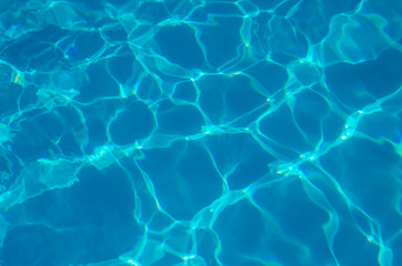 water in swimming pool rippled water detail background