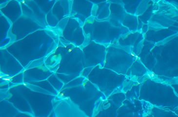 water in swimming pool rippled water detail background
