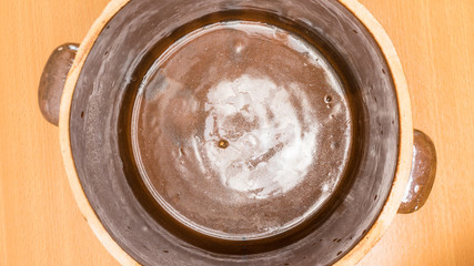 Brown clay jar view from above