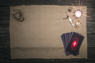 Tarot cards on fortune teller desk table background. Futune reading concept. Divination.