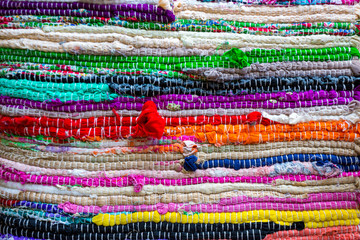 brazil textiles background of bright rugs