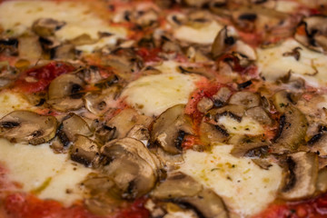 Close-Up Of Italian Pizza With Mushrooms, Cheese And Red Sauce.