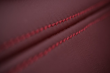 Detailed image of a car leather pleats stitch work.