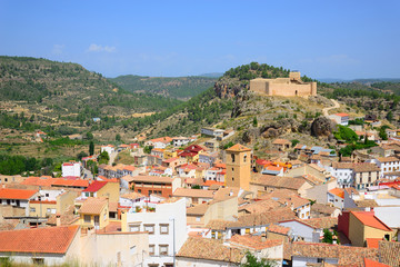 Fototapeta na wymiar Enguidanos, Spain - September 2, 2018: Population of Enguidanos and its castle.