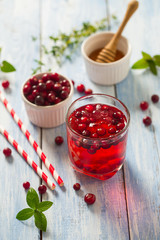 cranberry drink on wooden surface
