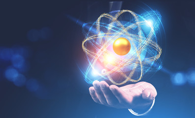 Man hand with hovering atom model hologram