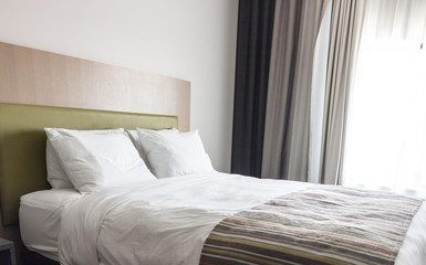 Elegant hotel bedroom, copy space image