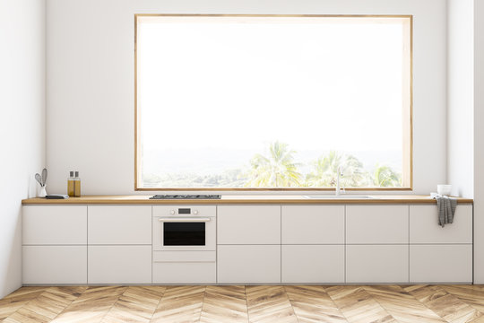 White kitchen interior with white countertops