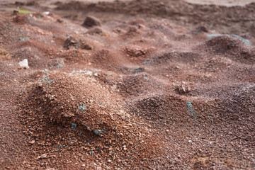Red earth or soil background. Tropical laterite soil  background of red clay. Dry Orange surface, Picture of natural disaster. Drought land Caused by global warming and deforestation.