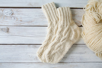 Fototapeta na wymiar knitted wooden socks